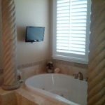 installed-flatscreen-tv-in-bathroom