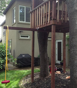 Custom tree house with swing