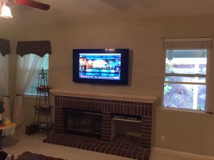 mounting flat screen above fireplace - after picture